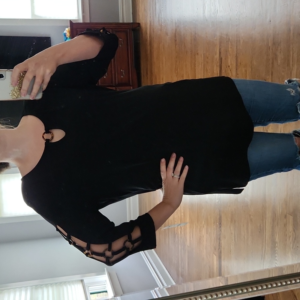 Black long sleeve cut-out blouse. Size L. JM Collection
